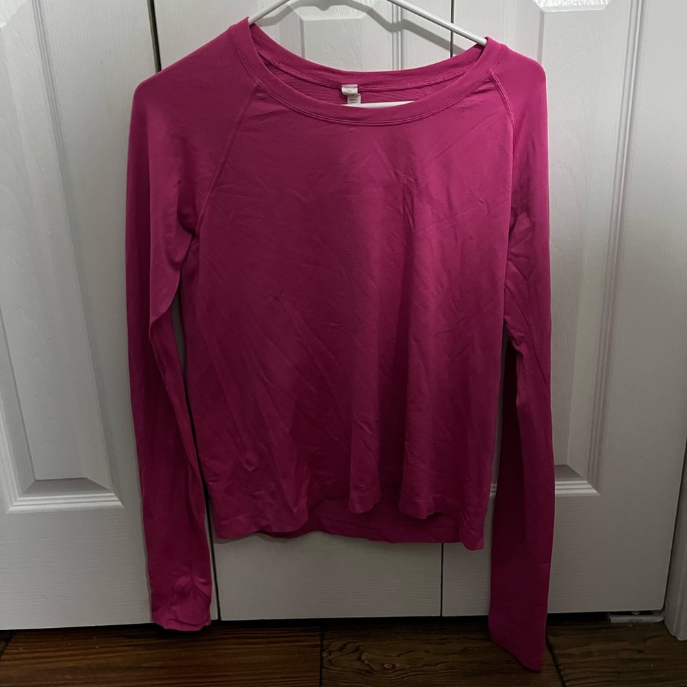 Size 12 pink lululemon swiftly tech long sleeve shirt